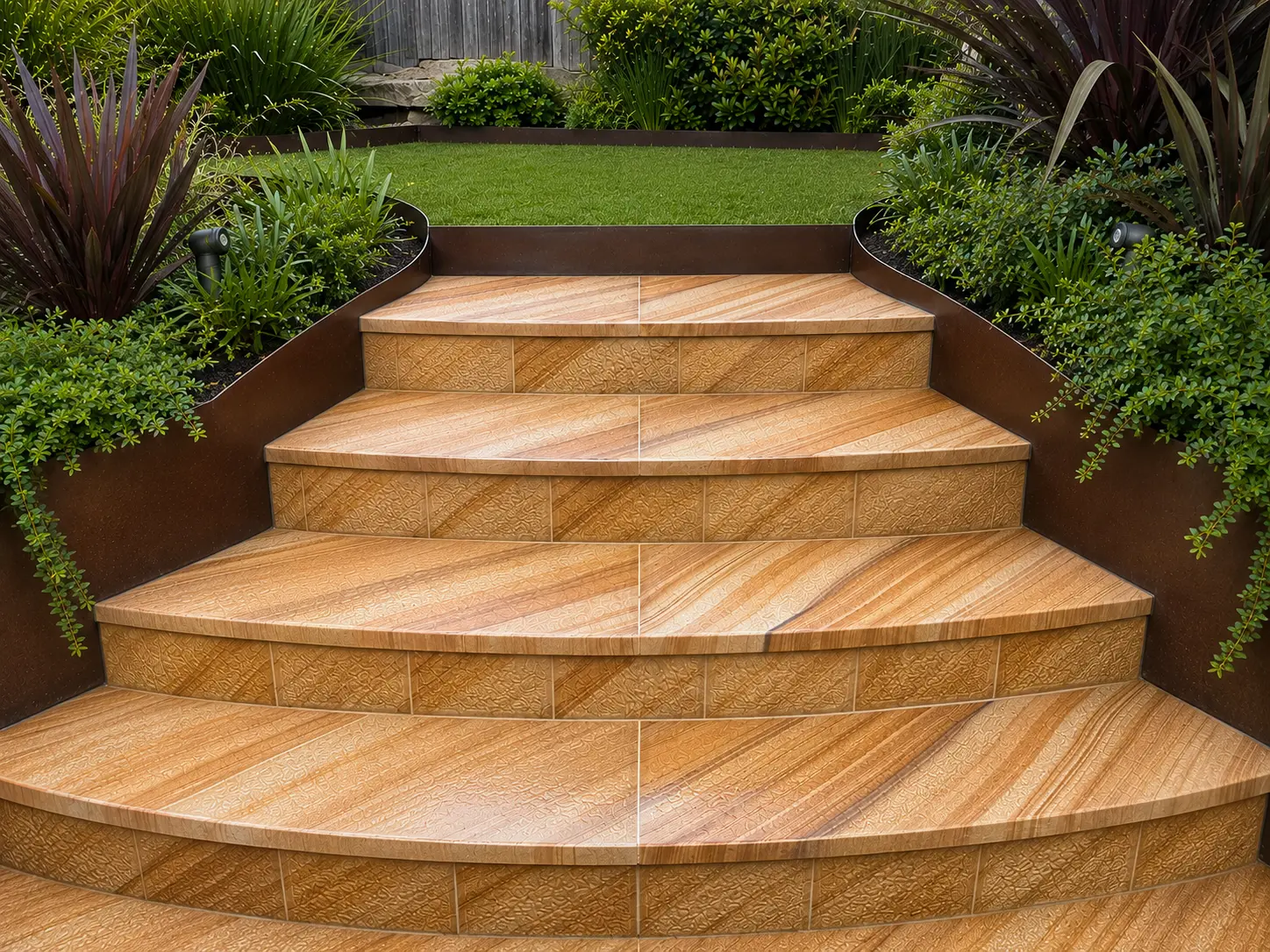 Curved sandstone step entry with lawn