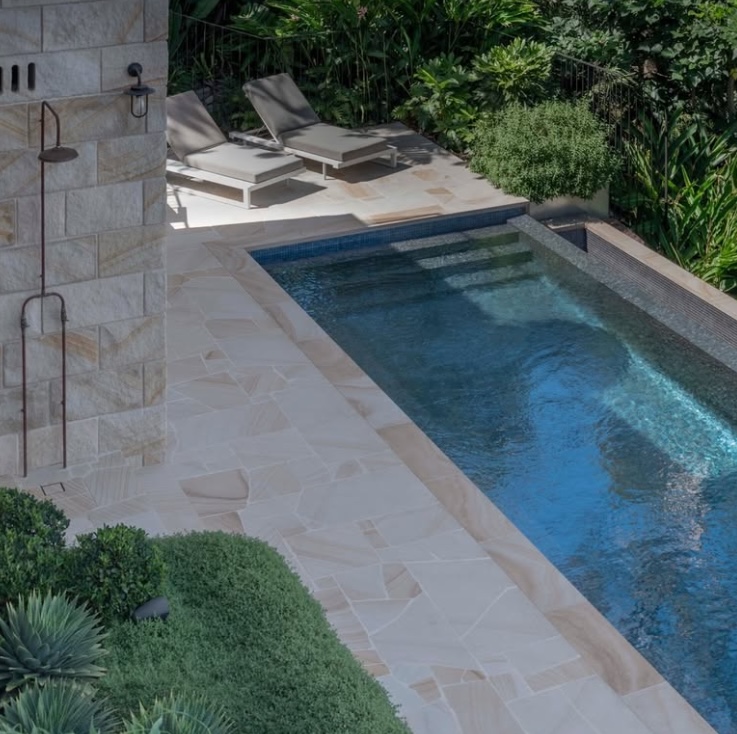 Sandstone crazy paving pool surround