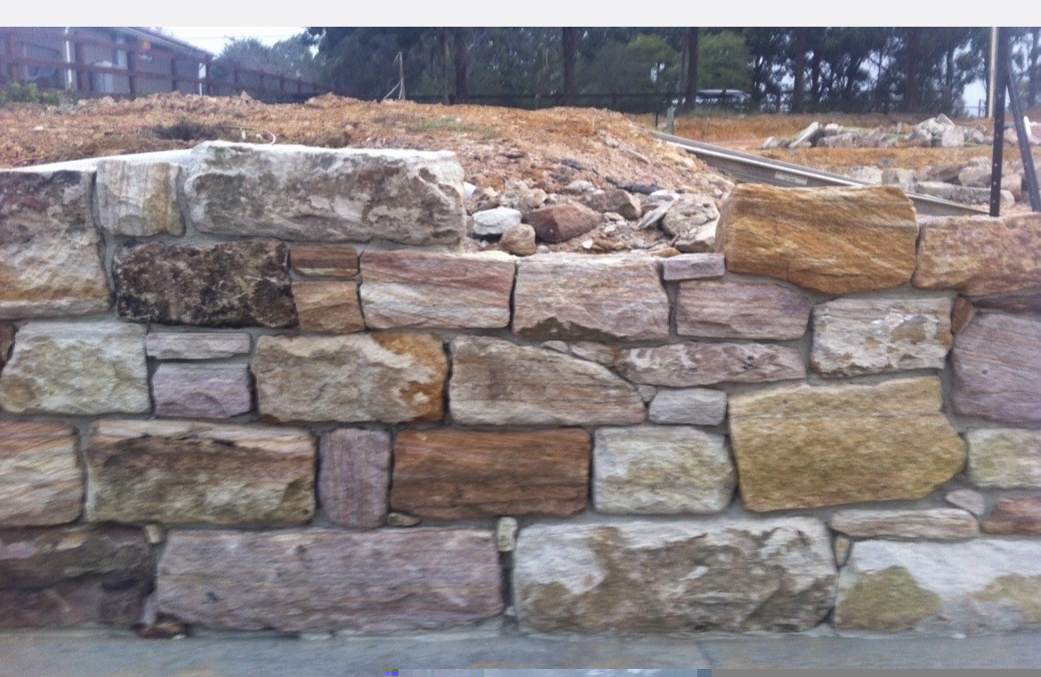 Sandstone boulder retaining wall