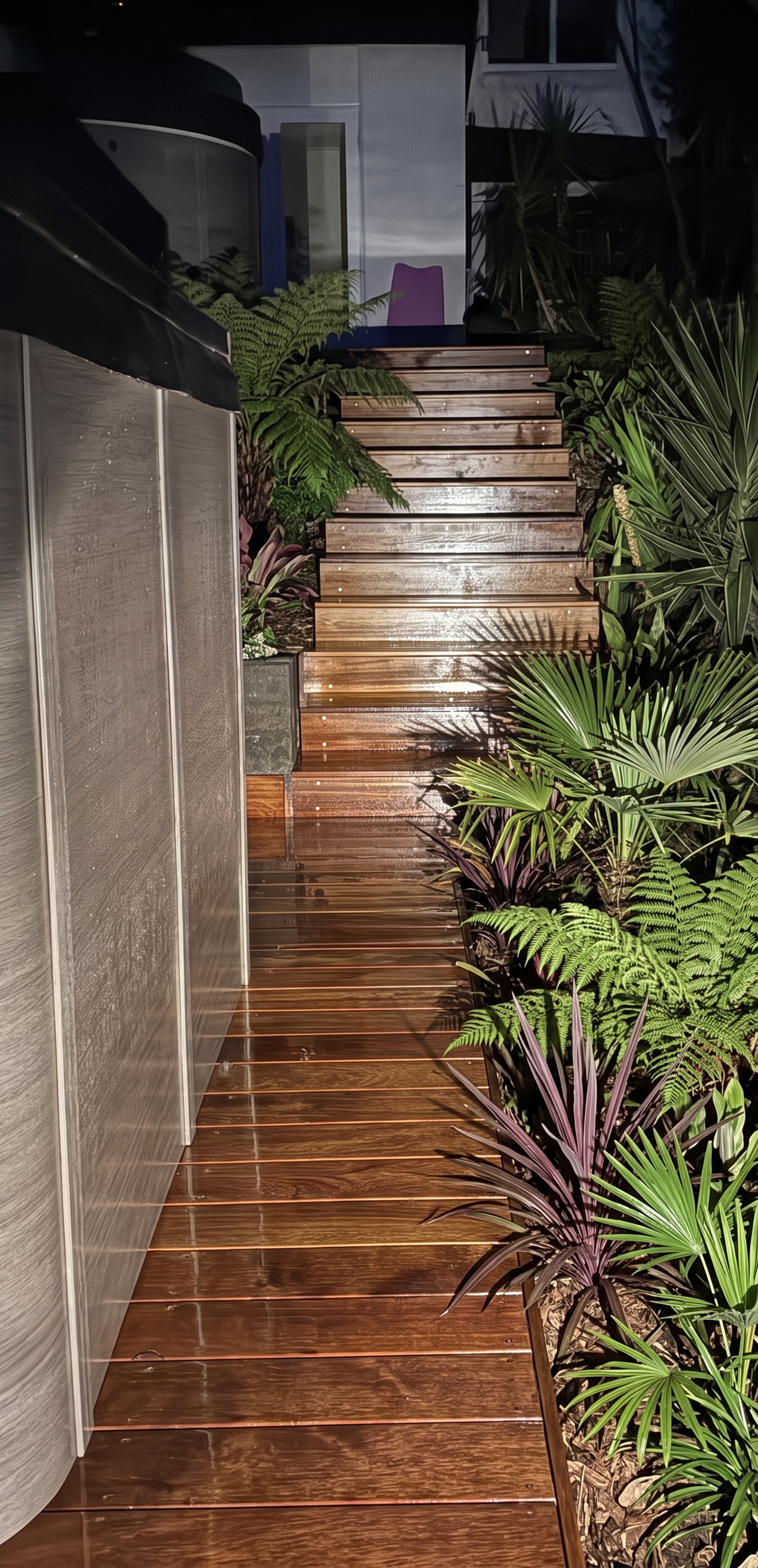 Timber deck staircase beside spa